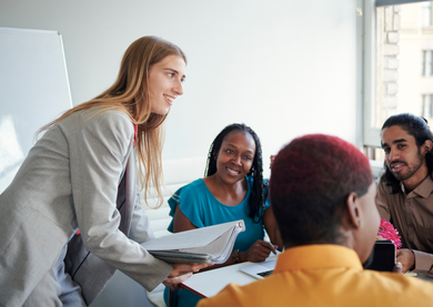 A team of people working on a project together and having fun.