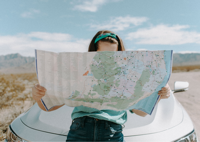 Young female looking at a map