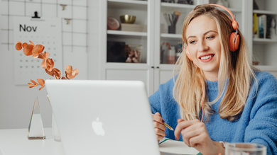 A woman having a virtual interview from home