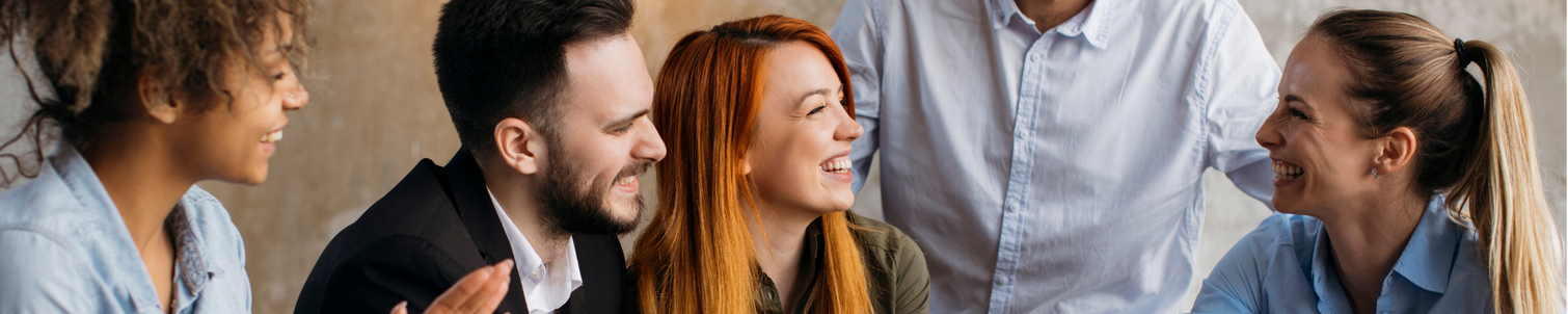 Corporate team welcoming employee back after their career break.